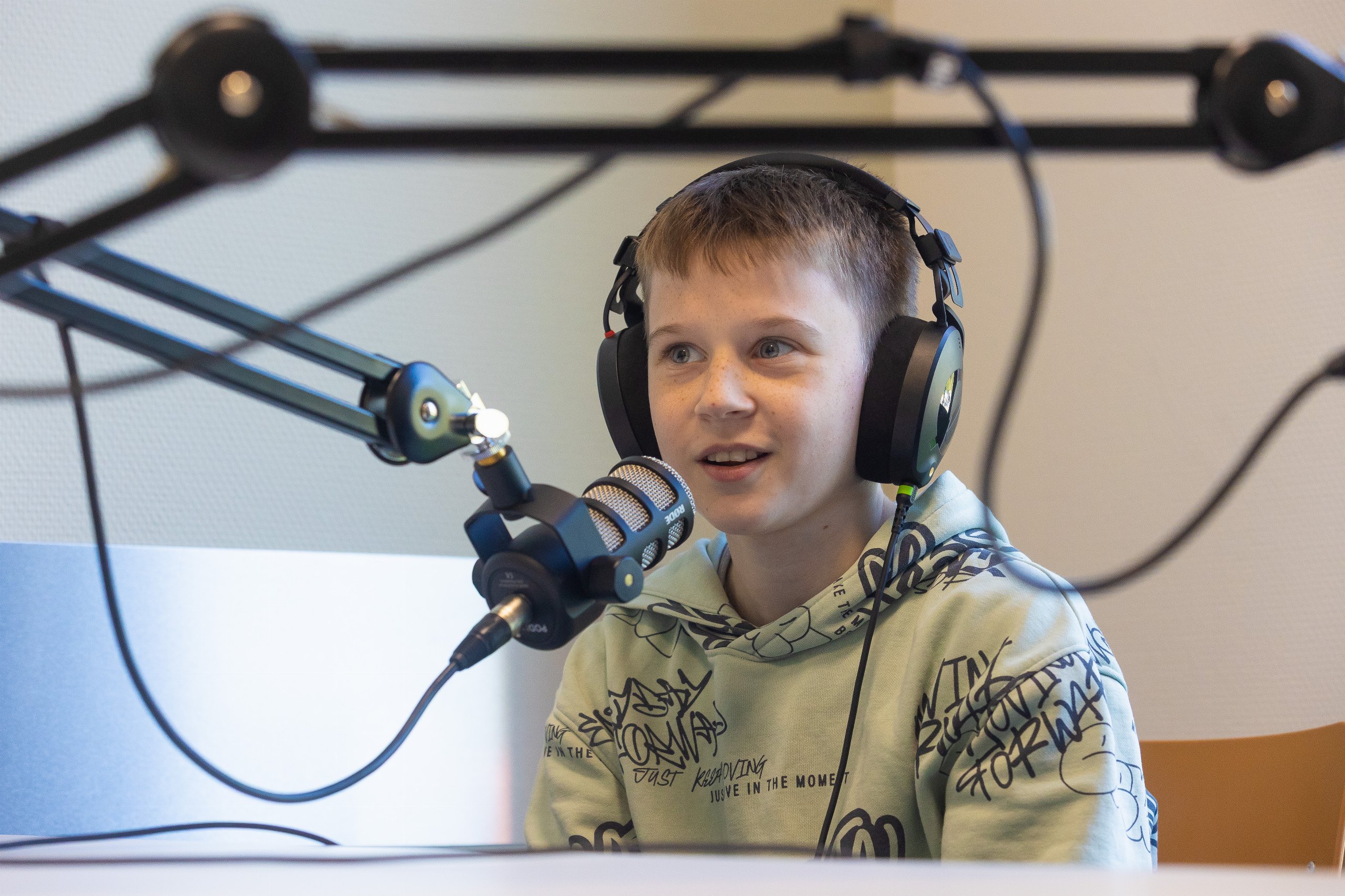 Leerling aan de microfoon